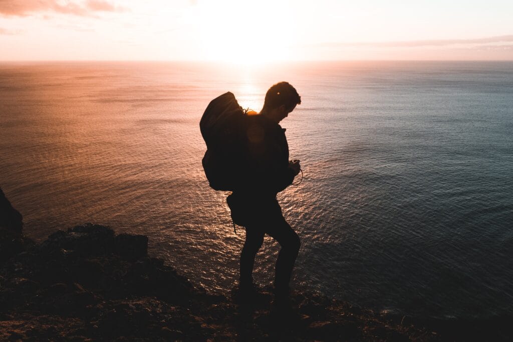 Solo hiker following solo hiking safety tips and sharing route details before setting off