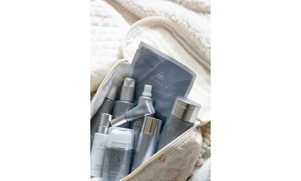 Clear toiletry bag prepared for carry-on security check with liquids and electronics organised for airport screening