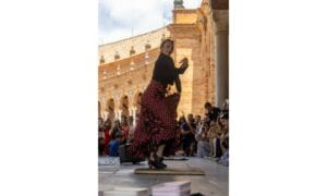 Woman Dancing in Front of a Crowd