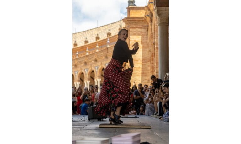 Woman Dancing in Front of a Crowd