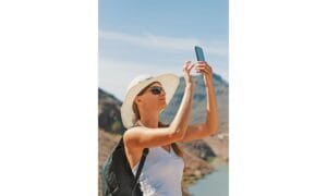 woman holding smartphone