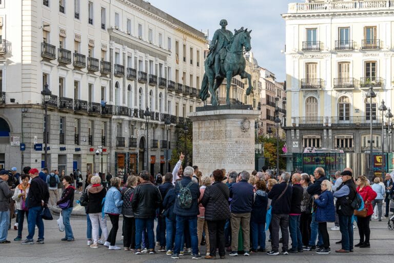 Tourists Gather at Madrid's Iconic Puerta del Sol