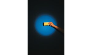 A person holding a card