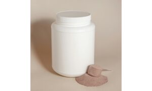 White Plastic Container without a Label and a Pile of Dry Food with a Clear Spoon