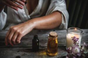 Women adding essential oil