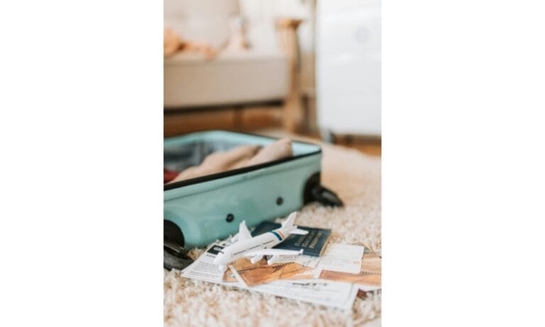 Blue suitcase on the floor