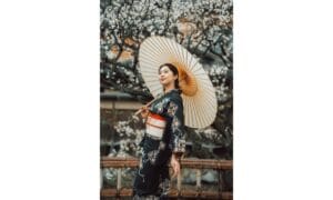 Japanese Woman in Kimono with Traditional Parasol