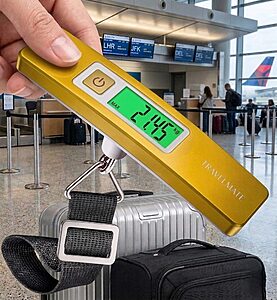 Traveller using a portable digital luggage scale to weigh a suitcase, with clear LCD display showing weight before airport check-in