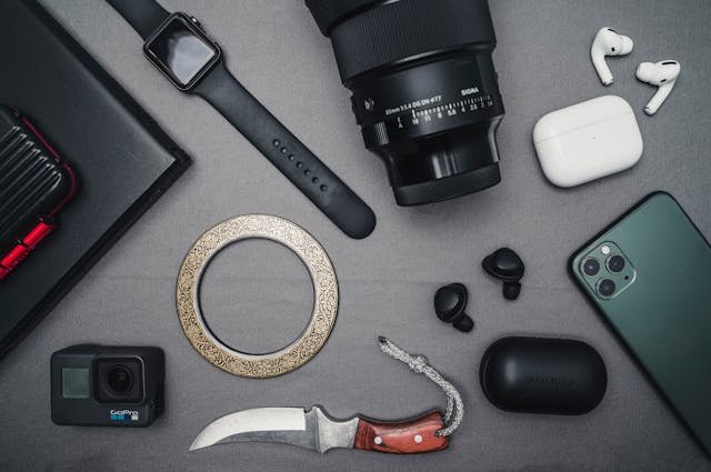 flat lay of essential electronic travel gadgets