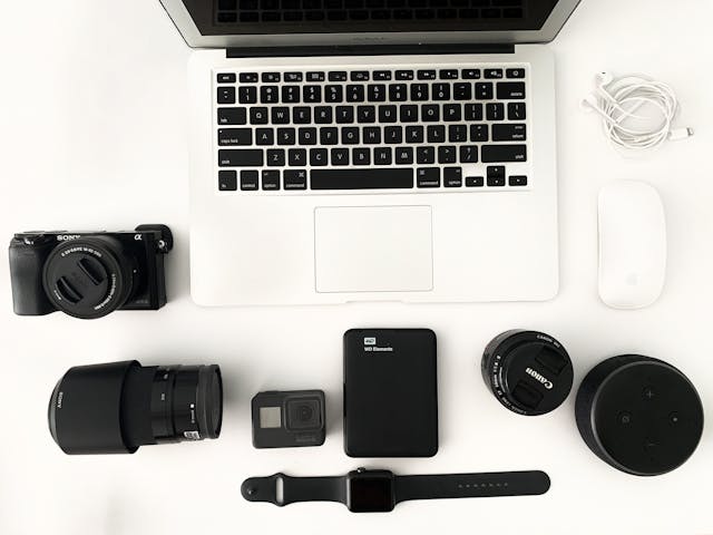 Laptop and camera accessories covered with gadget travel insurance
