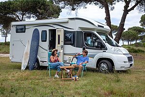• couple enjoying their outdoor campervan setup