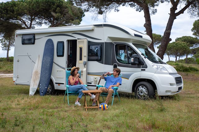 • couple enjoying their outdoor campervan setup