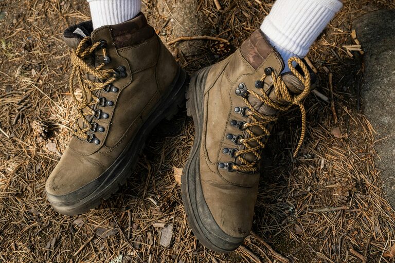 Close-up of walking socks and hiking boots.