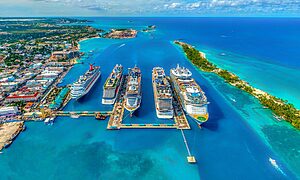 Aerial photography of white and blue cruise ships during daytime.