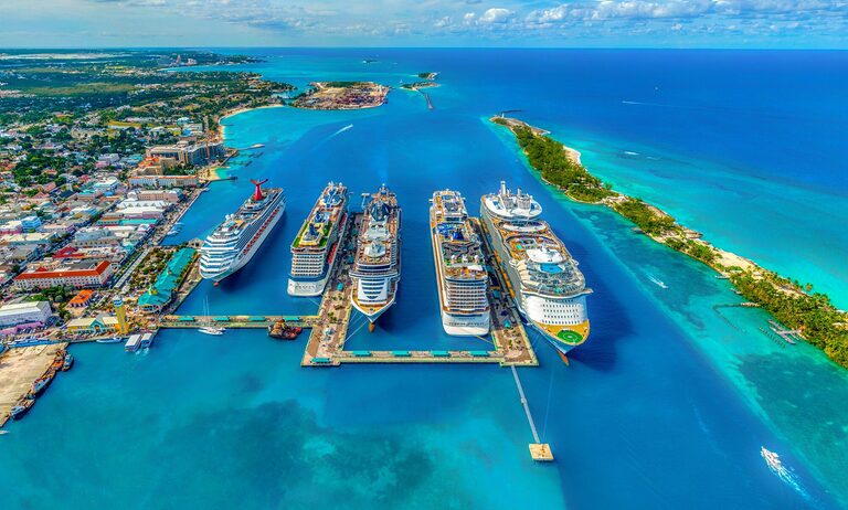 Aerial photography of white and blue cruise ships during daytime.